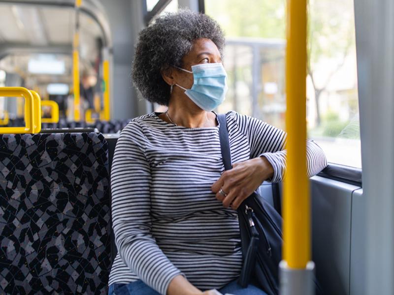 African-American woman on public transportation