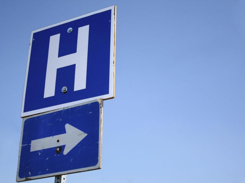 Arrow and hospital signs
