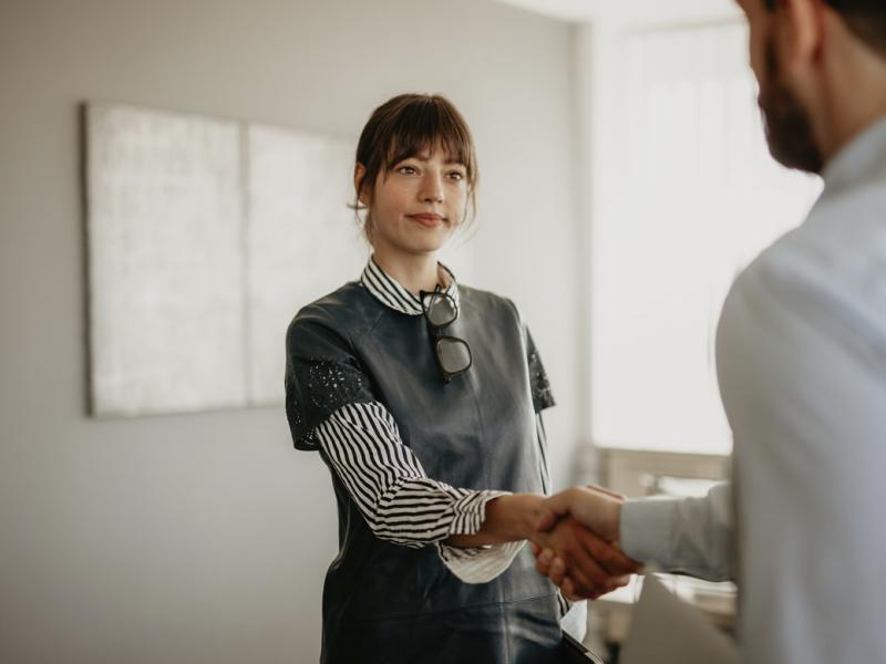 Two people shaking hands