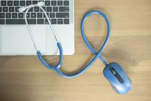 Stethoscope on laptop keyboard