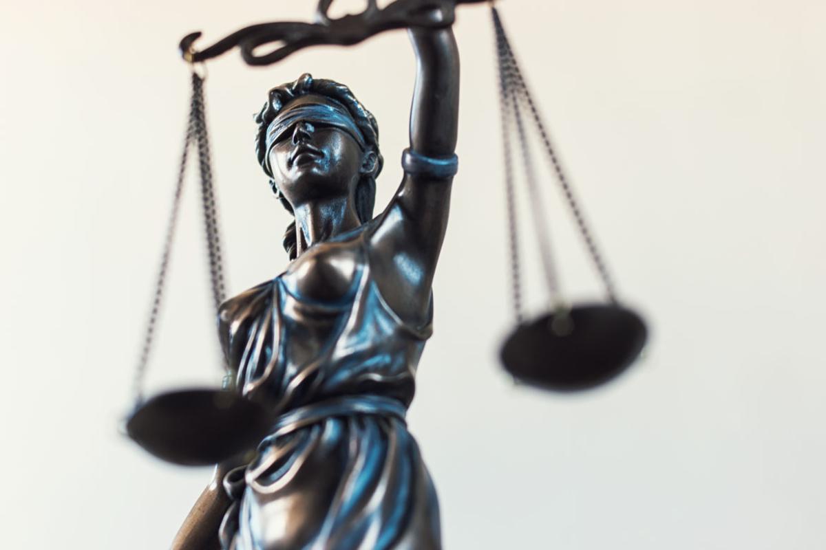 A statue holding the scales of justice