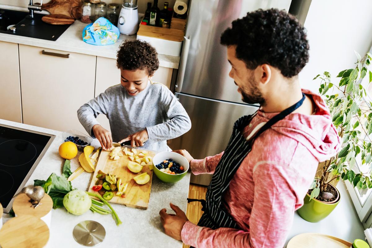 Family preparing  healthy food in the kitchen