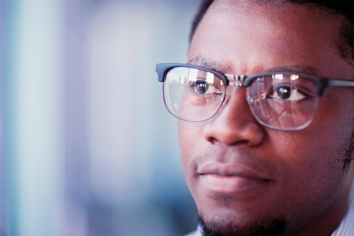 Close up of a man wearing glasses
