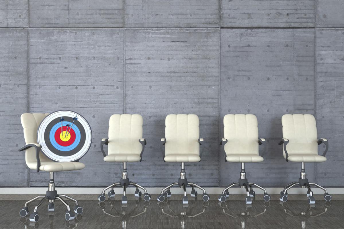 Row of chairs with a  bull's-eye target in one