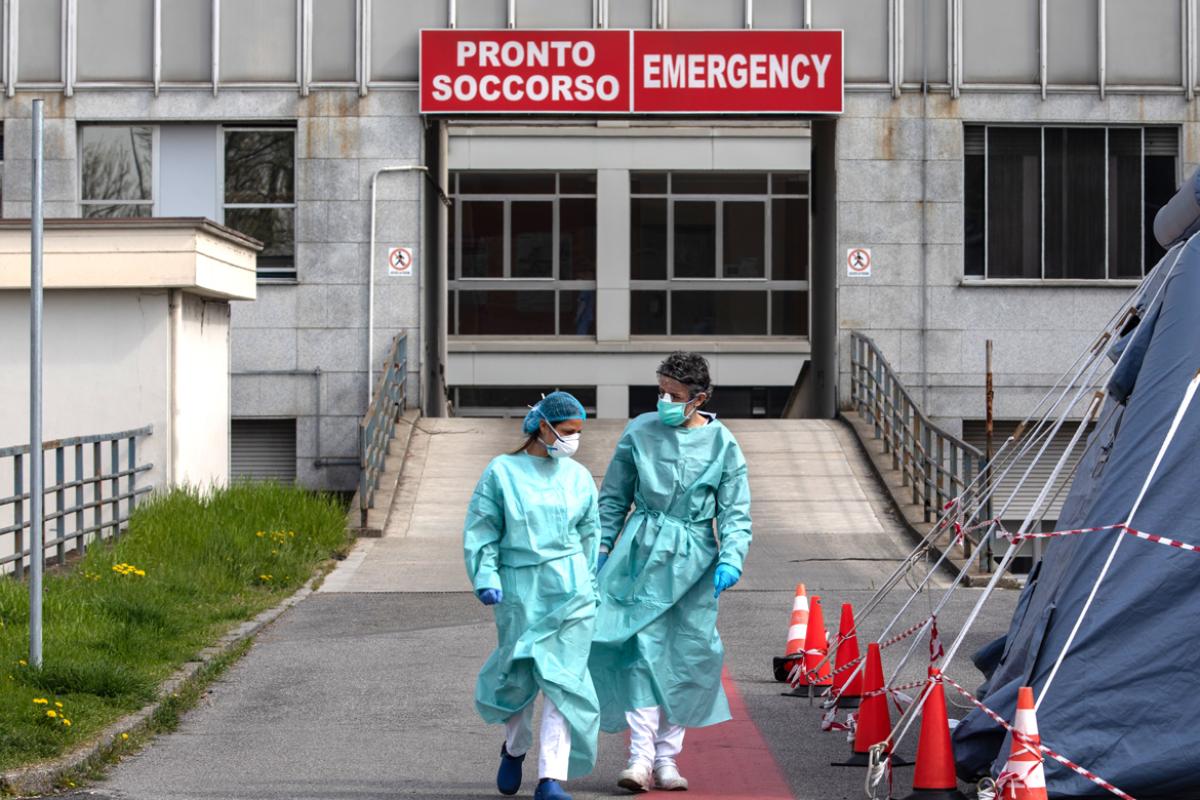 Two doctors outside of emergency room in Italy