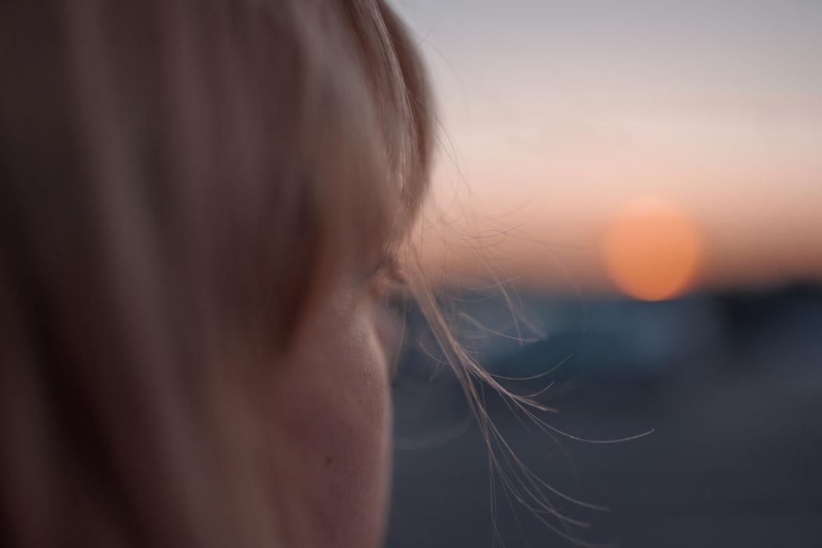 Close up of person looking out over a horizon