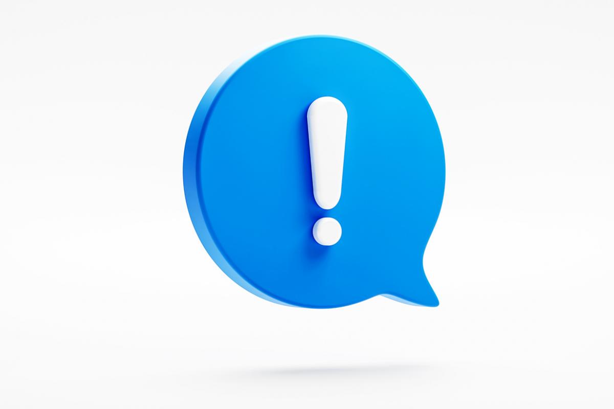 Exclamation point within a blue speech or dialogue balloon