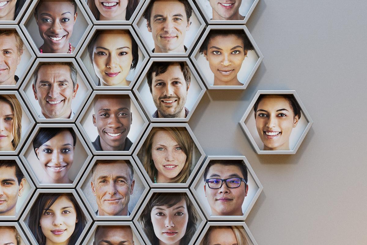 Hexagonal portraits of a diverse group of people linked together
