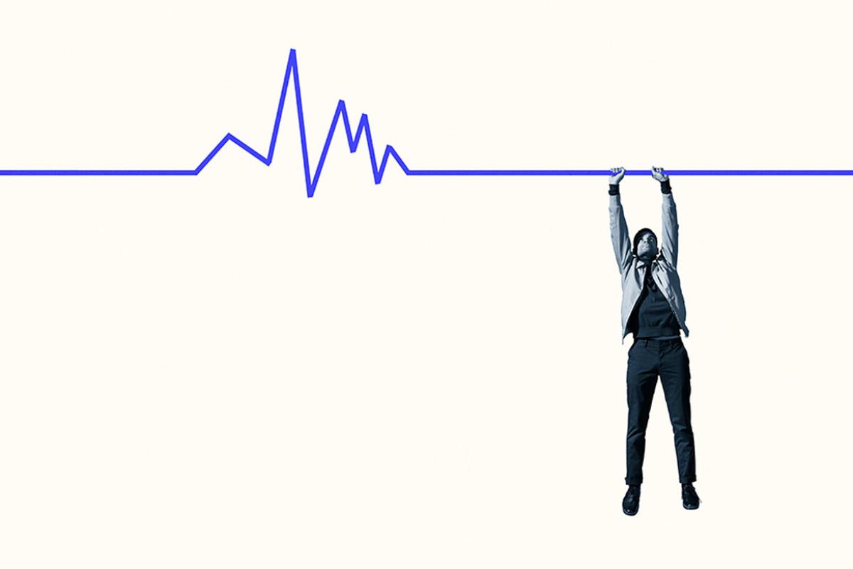Person hanging from blue line graph 