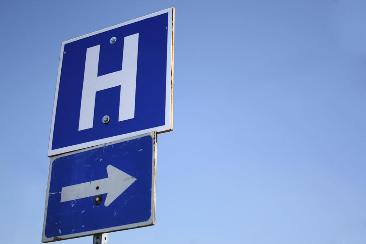 Arrow and hospital signs