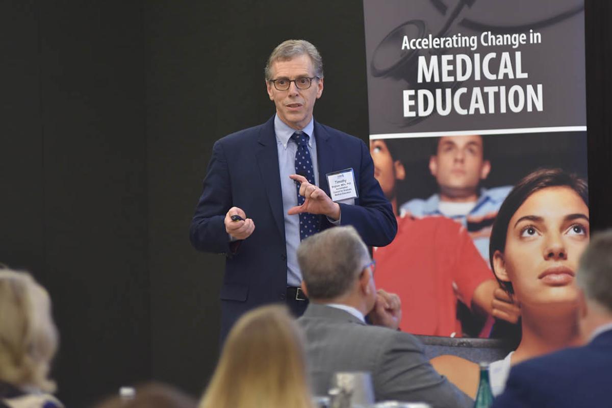 Timothy Brigham, MDiv, PhD speaking at AMA’s Accelerating Change in Medical Education Consortium.