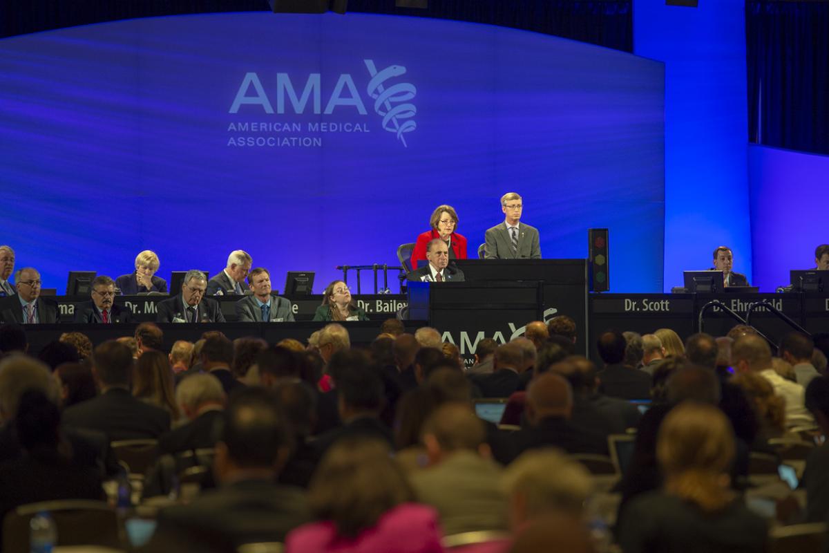 AMA delegates discuss gun violence at a recent meeting.