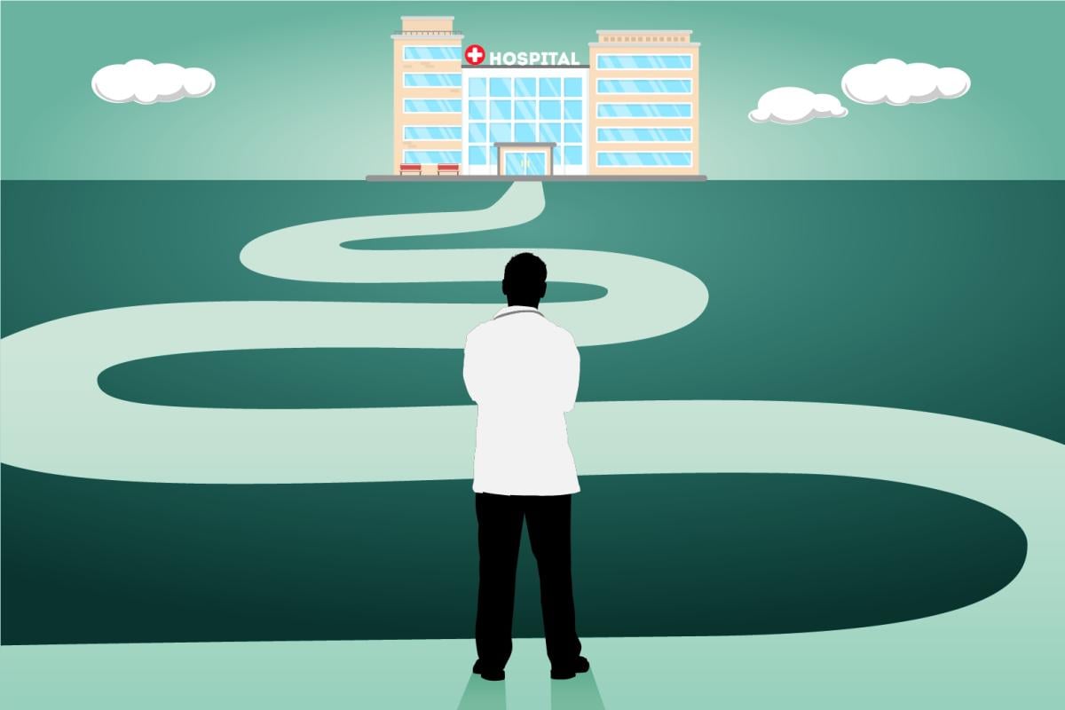 Doctor in front of path to hospital illustration
